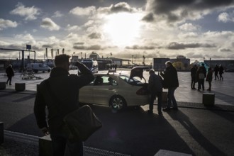 DEU Germany Germany Berlin Traveller looking for a taxi during the EVG strike at the main station
