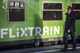 DEU Germany Germany Berlin A railway employee passes a Flixtrain during the EVG strike at the main