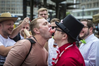DEU Germany Germany Berlin The grooms of two bachelor parties exchange rituals during their meeting