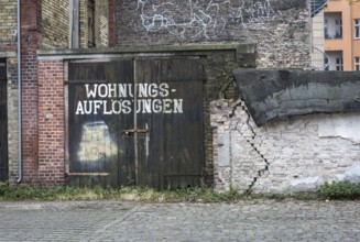 DEU Germany Germany Berlin A garage labelled Wohnungsauflösungen in Schöneberg