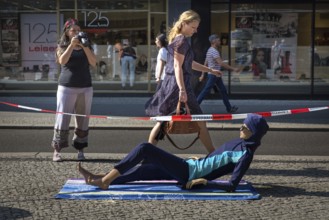 DEU Germany Germany Berlin A doll wearing a burkini lies at the entrance to the Französische Straße