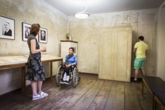 DEU Germany Germany Berlin Disabled tourist in a wheelchair explores Berlin with a city guide. Otto