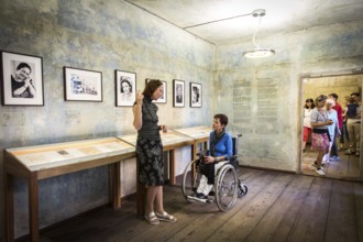 DEU Germany Germany Berlin Disabled tourist in a wheelchair explores Berlin with a city guide. Otto
