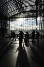 DEU Germany Germany Berlin Travellers cast their shadows in the main station at Washingtonplatz