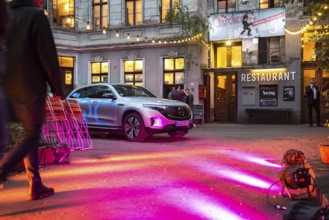 DEU Germany Germany Berlin Spotlights bathe the entrance to Clärchens Ballhaus in red light. Part