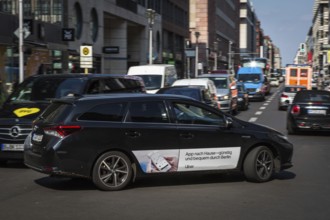 DEU Germany Germany Berlin An Uber taxi on Friedrichsstrasse