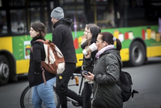 DEU Germany Germany Berlin A pedestrian crosses a pedestrian crossing near Bahnhof Zoo with a