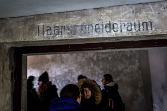 POL Poland Auschwitz Scenes at the Holocaust Memorial .Visitor entering the room for haircuts in