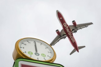 DEU Germany Germany Berlin Landing approach of an Air Berlin aircraft over Kurt-Schuhmacher-Platz