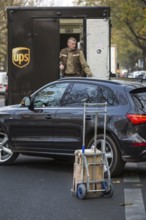 DEU Germany Germany Berlin A UPS parcel courier on Kurfürstendamm