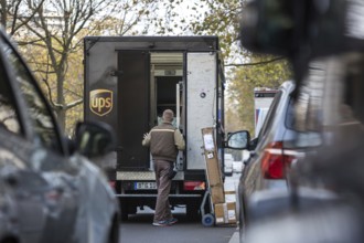 DEU Germany Germany Berlin A UPS parcel courier on Kurfürstendamm