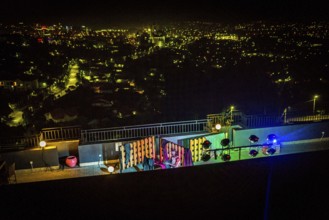 RWA RWANDA RUANDA Kigali A performance by the dancer Shema Isaak on the terrace of the Panorama Bar