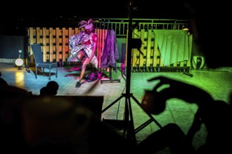 RWA RWANDA RUANDA Kigali A performance by the dancer Shema Isaak on the terrace of the Panorama Bar