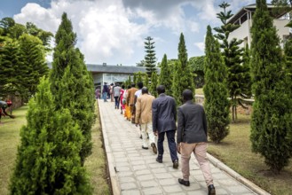 RWA RWANDA RUANDA Kigali Visitors on their way to the Kigali Genocide Memorial