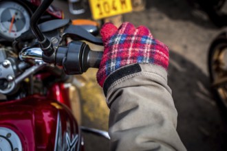 RWA RWANDA RUANDA Kigali A taxi driver with home-made chequered gloves