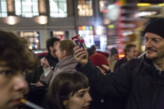 DEU Germany Germany Berlin Smoking for Deniz in front of the Taz