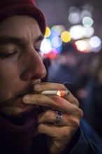 DEU Germany Germany Berlin Smoking for Deniz in front of the Taz