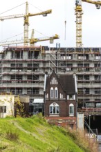 DEU Germany Germany Berlin View of a construction site with a heritage-protected building in front