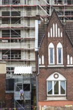 DEU Germany Germany Berlin View of a construction site with a heritage-protected building in front
