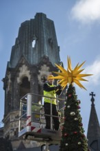 DEU Germany Germany Berlin Setting up the Christmas market at Breitscheidtplatz. The memorial