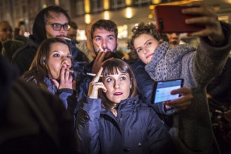 DEU Germany Germany Berlin Smoking for Deniz in front of the Taz