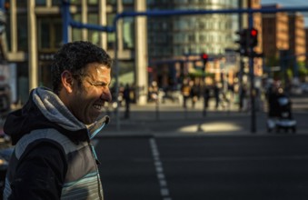 DEU Germany Germany Berlin A man in the sun at Potsdamer Platz