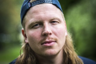 DEU Germany Germany Berlin East German rapper Finch Asozial in a park in Tempelhof