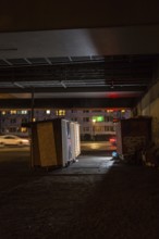 DEU Germany Germany Berlin Wooden shacks financed by donations stand under the motorway bridge in