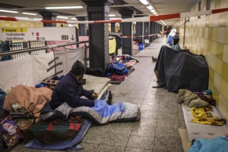 DEU Germany Germany Berlin Homeless people spend the night in a passageway at Lichtenberg