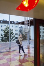 DEU Germany Germany Berlin Scenes in and around the S-Bahn.waiting woman in Pankow