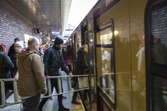 DEU Germany Germany Berlin Scenes in and around the S-Bahn.man travelling with ladder at