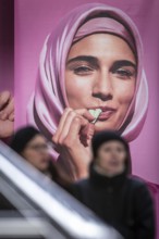 DEU Germany Germany Berlin An advertising banner with a Muslim woman promoting Katjes vegetarian