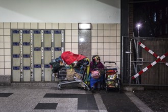 DEU Germany Germany Berlin Scenes of homeless people around Bahnhof Zoo. Woman with her belongings