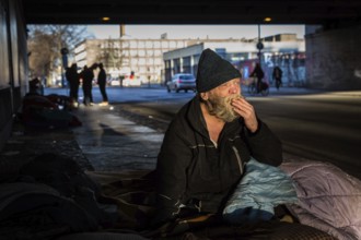 DEU Germany Germany Berlin Scenes of homeless people around Bahnhof Zoo.Gerard on his bed under a