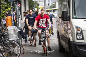 DEU Germany Germany Berlin scene with cyclists in the capital.cyclists and pedestrians get in each