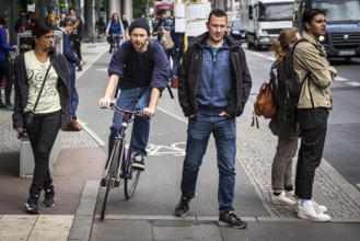 DEU Germany Germany Berlin scene with cyclists in the capital.cyclists and pedestrians get in each