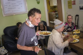DEU Germany Germany Berlin Homeless woman meet at Eva's Haltestelle, a drop-in centre for those in