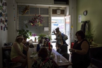 DEU Germany Germany Berlin Homeless woman meet at Eva's Haltestelle, a drop-in centre for people in