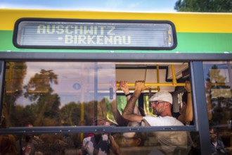 POL Poland Poland Auschwitz-Birkenau Tourists on the bus on the way to the Auschwitz-Birkenau camp
