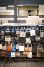DEU Germany Germany Berlin Handbags at a market in Buckow