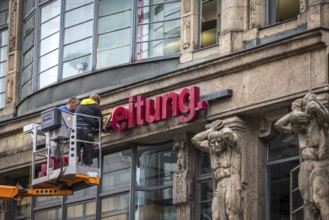 DEU Germany Germany Berlin The dismantling of the TAZ lettering on the old TAZ building on