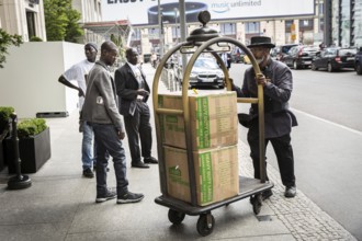 DEU Germany Germany Berlin Supporters of the Senegalese president in front of the Ritz Carlton