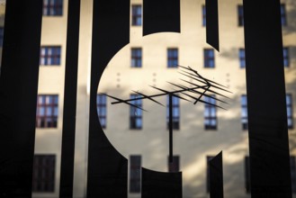 DEU Germany Germany Berlin The symbol of a television aerial on a glass façade in front of the