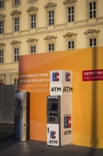 DEU Germany Germany Berlin An EC machine in front of the façade of the rebuilt city palace