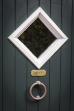 DEU Germany Germany Rysum The name Merkel is written on a door in the East Frisian town of Rysum