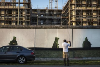 DEU Germany Germany Berlin A tourist takes a mobile phone photo of the installation 'Beyond the
