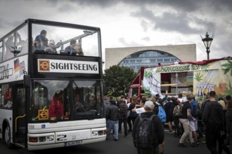 DEU Germany Germany Berlin Scene of the Hanfparade. Sightseeing bus passes the parade