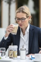 DEU Germany Germany Berlin AFD top candidate Alice Weidel drinks a cafe latte in front of a press