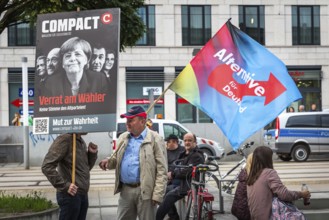 DEU Germany Germany Dresden Pegida demonstration in the city centre. AFD flag and Merkel protest