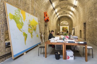 DEU Germany Germany Berlin The Chinese artist Ai Weiwei in his studio in the vaulted cellar of the